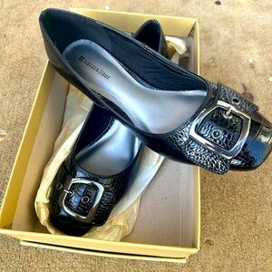 Size 10 black pump heels - worn only once!  Instantly upgrades your outfit.